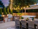 Outdoor kitchen, dining, and hot tub patio.