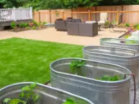 Four-foot metal vegetable planters with irrigation.